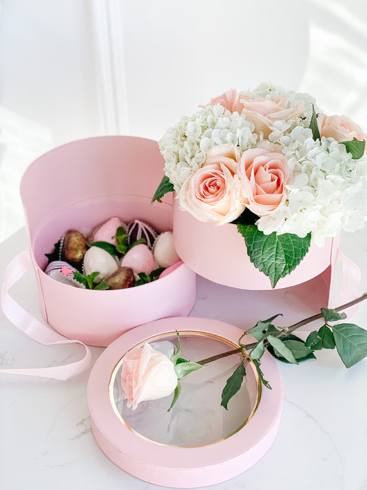 bouquet of chocolate dipped strawberry shaped marshmallows, Includes floral arrangement on top of box.
